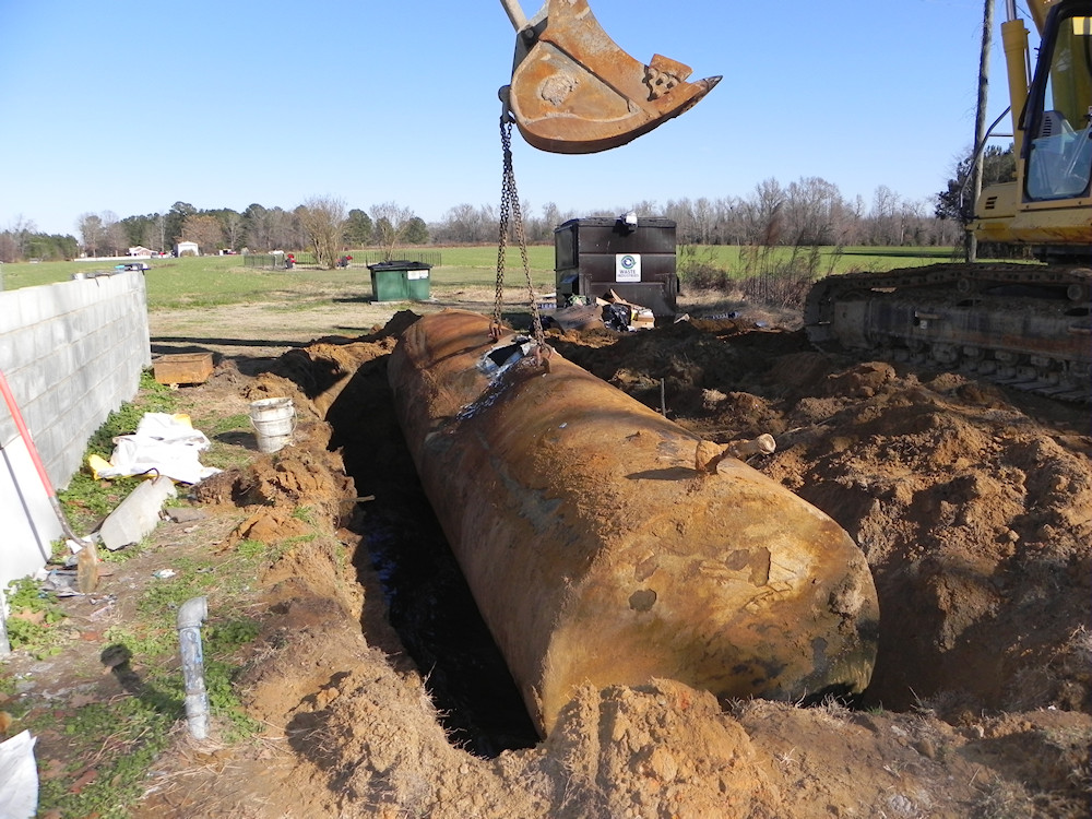4000-gallon gasoline underground storage tank being removed