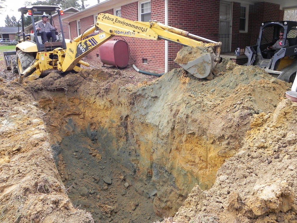 Excavating contaminated soil.