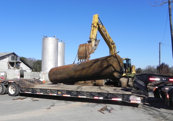 4000-gallon gasoline underground storage tank being removed