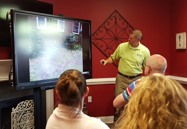 Robert A. Payne presenting an information session about leaking oil tanks.