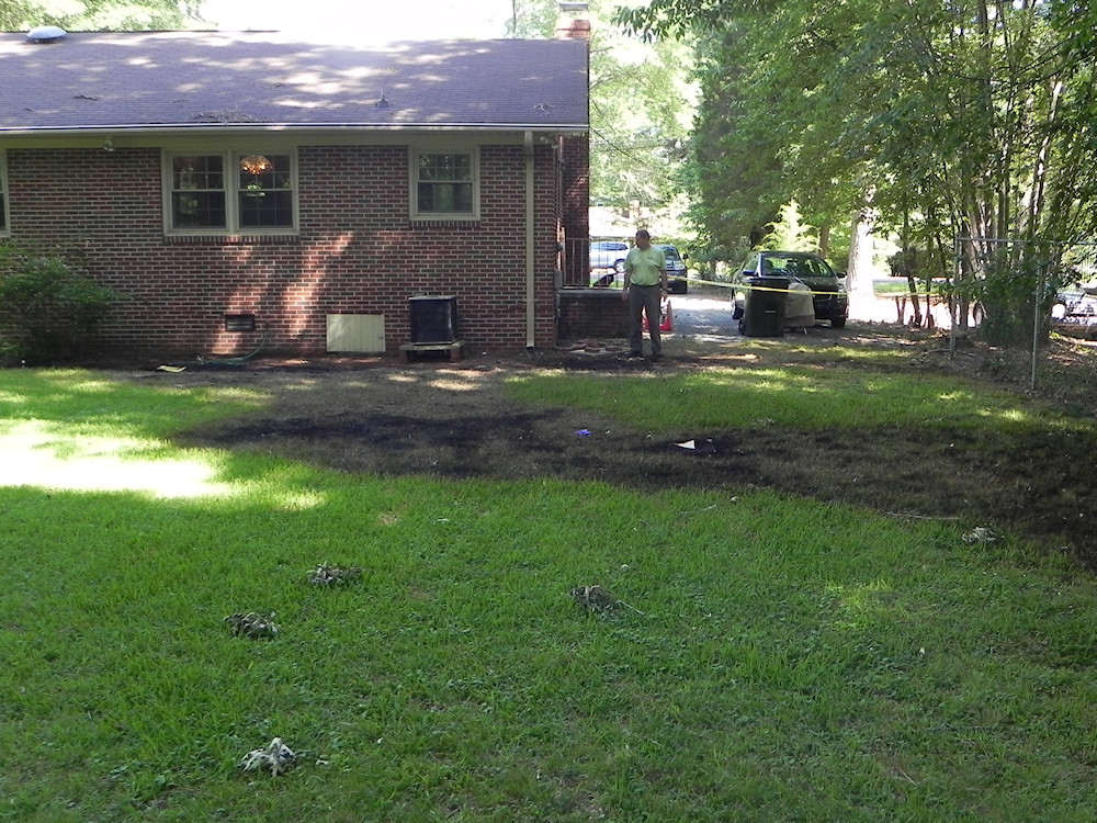 Surface overflow from underground oil tank. Surface overflow from underground oil tank.